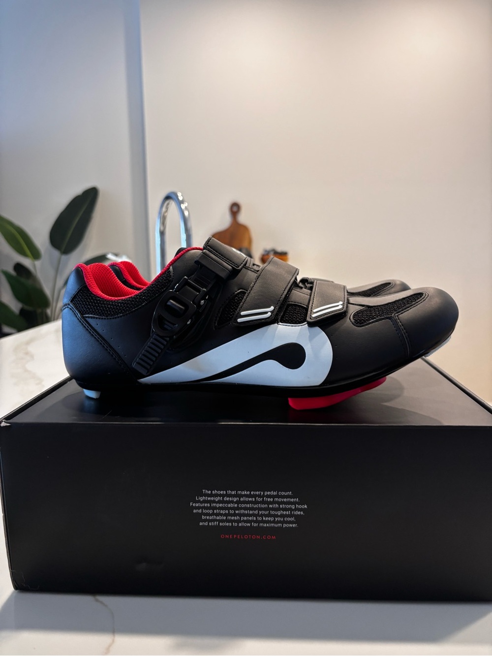 Peloton Black Cycling Shoe with White Swoosh and Red Lining